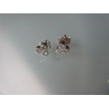 Pair of 9ct white gold diamond set ear studs