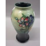 Mid 20th Century Moorcroft baluster form vase with tubeline floral decoration, on a green and blue
