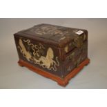 19th Century Chinese lacquer table cabinet with painted stylised decoration, the hinged lid