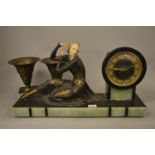 Large Art Deco black slate, green onyx patinated and gilded spelter and composition clock garniture,