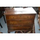 George III oak chest, the moulded top above three drawers with brass swan neck handles and