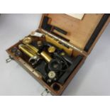 C. Reichert, Austrian gilt brass and black japanned monocular microscope, numbered 68424, in