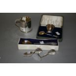 Birmingham silver Christening mug, 1919, together with a cased silver eggcup and spoon, silver