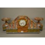 Large Art Deco pink flecked and grey marble three piece clock garniture with gilt metal mounts,