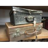 Rudall Carte and Co. German trumpet, together with a small brown leather suitcase