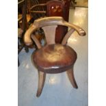 19th Century mahogany splat back tub chair with leather overstuffed seat, raised on four splay