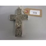 Silver plated crucifix decorated with various scenes in panel form, depicting the story of Christ,