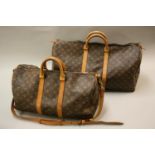 Louis Vuitton holdall with tan leather trim together with a similar smaller holdall with shoulder