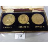 Cased 1911 Coronation set of three Monarch medals, Victoria, Edward VII and George V by Vaughtons,