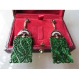 Pair of square panel jade drop earrings set diamonds and black enamel decorated