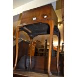 Early 20th Century mahogany work box with a hinged lid on cabriole supports