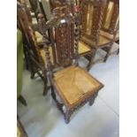 Set of four George III mahogany dining chairs with turned, pierced and moulded rail backs,