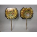 Pair of 19th Century painted papier mache hand screens with turned carved and gilded handles