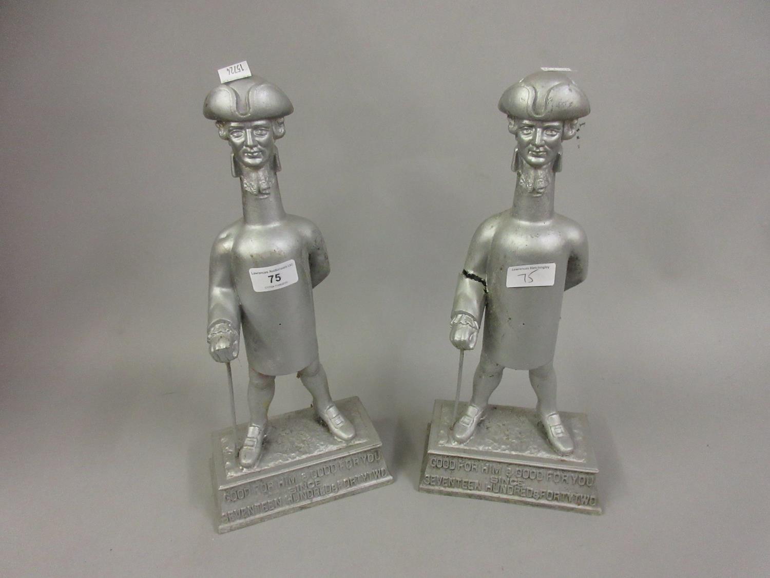 Pair of Worthington cast aluminium advertising figures, ' Good for Him ' and ' Good for You '