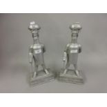 Pair of Worthington cast aluminium advertising figures, ' Good for Him ' and ' Good for You '