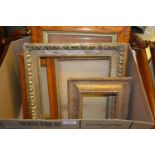 Box containing a quantity of antique carved giltwood, maplewood and other frames