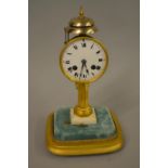 19th Century French pillar clock, the enamel dial with Roman numerals striking on two bells on a