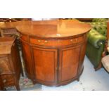 Late 19th Century satinwood and inlaid demi lune side cabinet, the segmented top above a single long