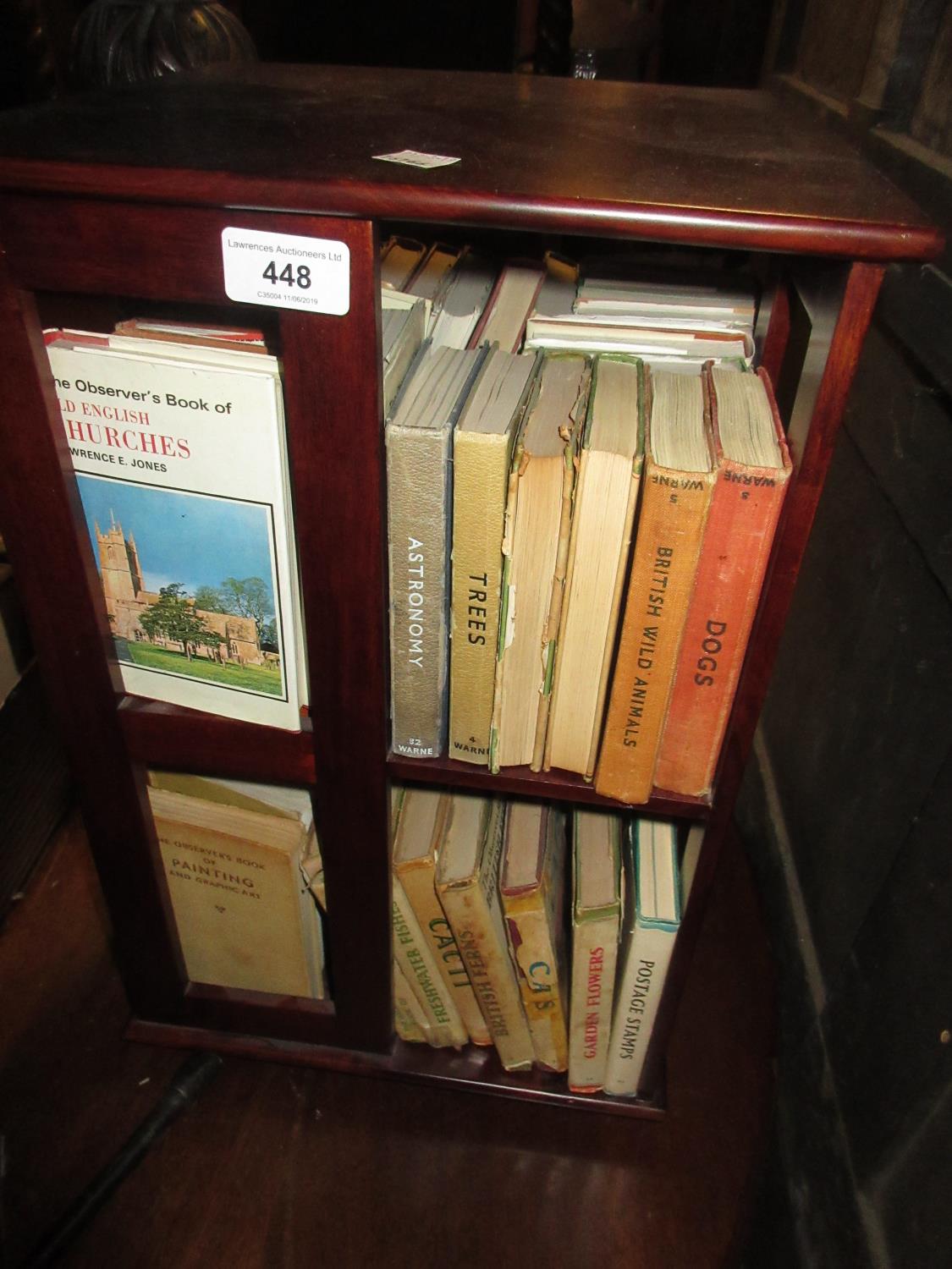 Mahogany table top revolving bookcase containing collection of Observer books