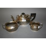 Sheffield silver three piece teaset with ebonised handle, makers mark for Mappin & Webb