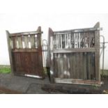 Pair of teak garden double gates with original wooden posts, 56ins high, 46ins wide each, with