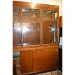 Large mahogany three door display cabinet and a mid 20th Century oak twin pedestal office desk