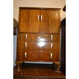 Art Deco walnut compactum cabinet, together with a pair of walnut bedside cabinets