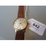 Gentleman's 9ct yellow gold cased Tissot wristwatch, the dial with Arabic numerals and later brown