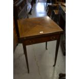 Edwardian mahogany and inlaid envelope card table with a single frieze drawer raised on square