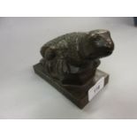 Small dark patinated bronze figure of a salamander inscribed to the base ' Der Goldene