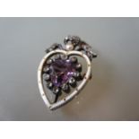 Edwardian heart shaped pendant brooch set amethyst, diamonds and a seed pearl with white enamel