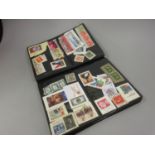 Album containing a collection of approximately five hundred World postage stamps