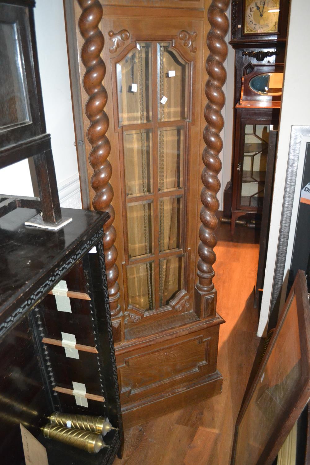 Early 20th Century oak longcase clock, the shaped moulded pediment with a carved floral cresting - Image 2 of 2