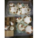 Two boxes containing an extensive collection of Royal Albert Old Country Roses pattern dinner and