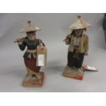 Pair of 19th Century Chinese carved and painted polychrome figures of trades people, each on a