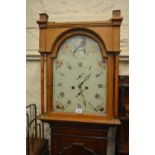 Oak longcase clock having a painted dial and two train eight day movement