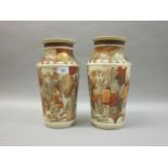 Pair of early 20th Century Satsuma pottery vases painted with figures in landscapes, 11.5ins high