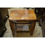 Nest of three rectangular walnut occasional tables