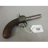 Small 18th / 19th Century percussion pistol with engraved decoration and touch marks to the barrel