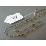 9ct Gold muff chain with a 10ct gold clip 16g