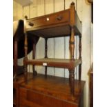 19th Century mahogany two tier buffet with single drawer having knob handles, on turned supports,