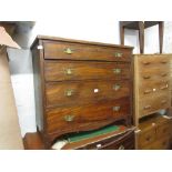 George III mahogany straight front chest of four graduated long drawers with brass handles raised on