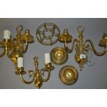 Pair of brass two branch wall lights, similar smaller two branch wall light, two brass teacups