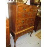 18th Century walnut chest on stand, the moulded top above two short and three long drawers with