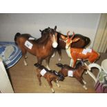 Beswick figure of a chestnut standing horse, another of the same size (at fault), two Beswick