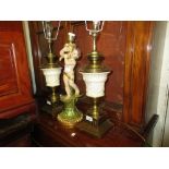 Pair of reproduction cream glazed pottery and brass mounted table lamps together with a gilded and