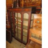 Edwardian mahogany and inlaid two door display cabinet on splay supports