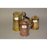 Art Nouveau embossed copper lidded jug by J.S. & S., an Arts and Crafts brass jug and a brass