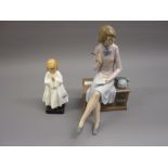 Royal Doulton figure, ' Bedtime ' together with a Nao figure of a lady seated on a desk