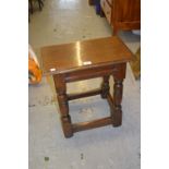 Reproduction oak joint stool on turned supports with stretchers